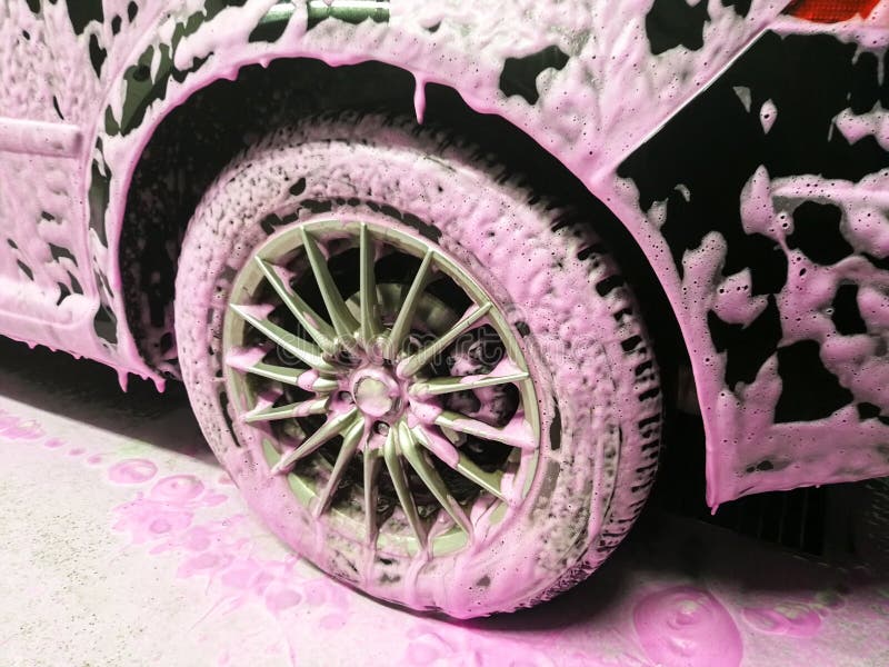 Pink foam in car wash stock photo. Image of wheel, garage 142294000