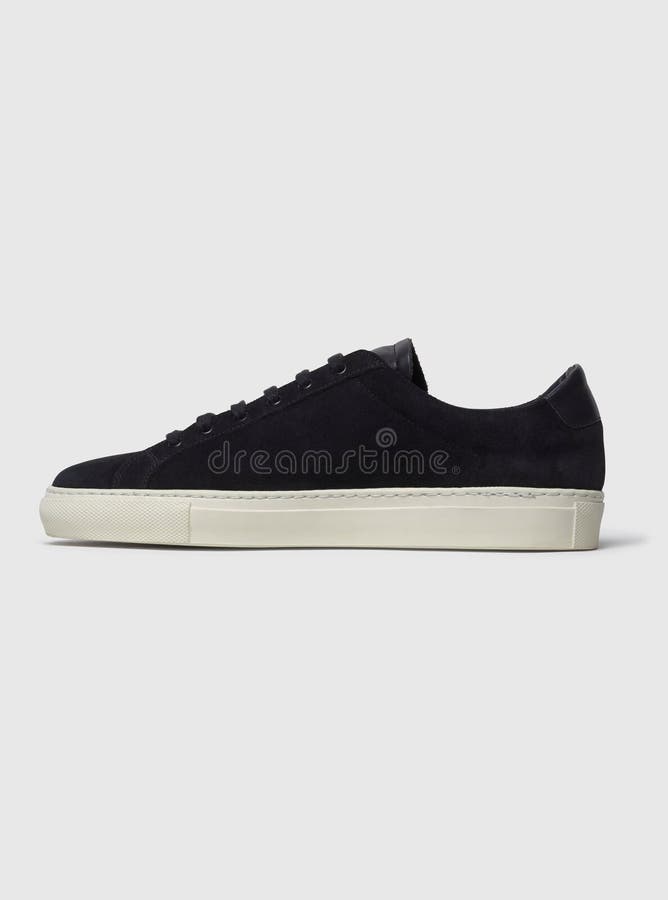 Black Casual Sneakers with Black Base and White Background Stock Photo ...