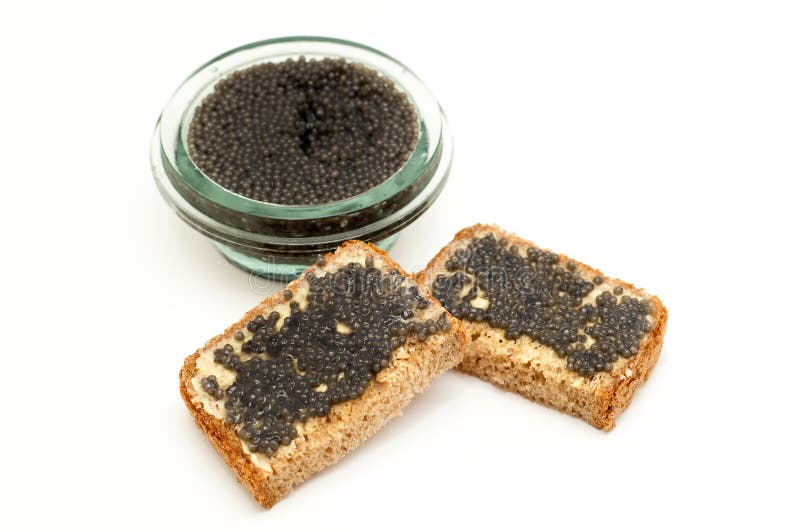 Black caviar in a jar and bread