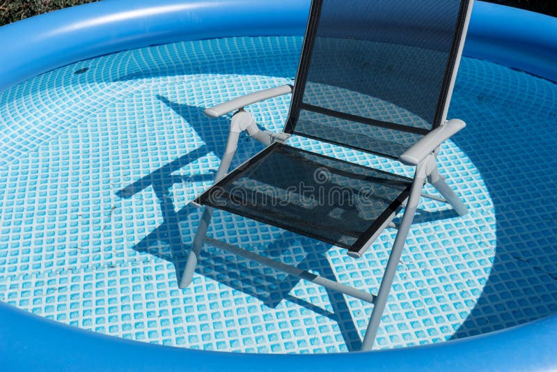 Chair To Relax in the Swimming Pool Stock Photo Image of sunshine