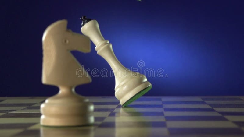 Black chess piece falling over, Stock Video