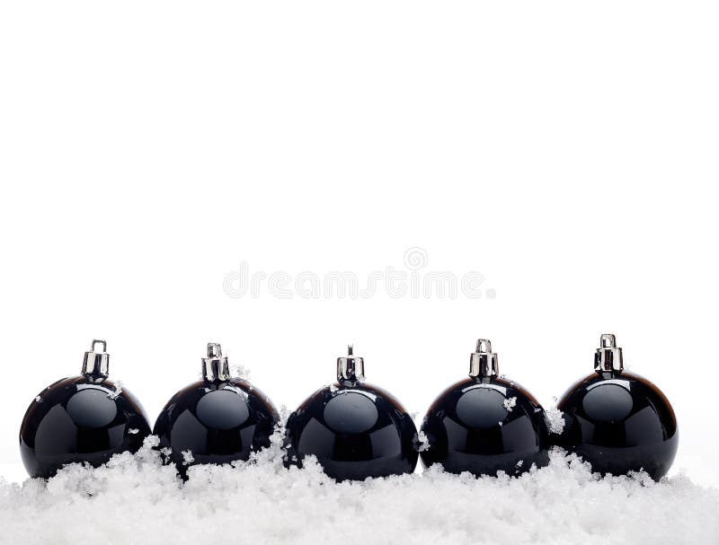 Black christmas balls with snow
