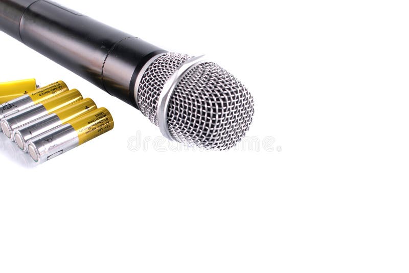 Black classic microphone with new batteries isolated on white background. royalty free stock image Black classic microphone with new batteries isolated on white background. royalty free stock image