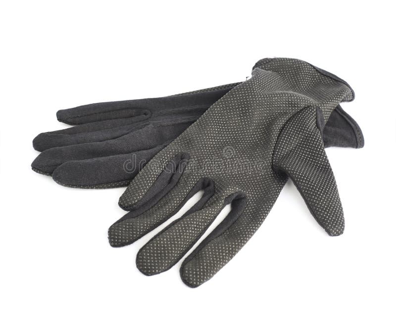 Pair of black cloth working gloves with the rubber pimples isolated over the white background. Pair working gloves stock images, royalty-free photos and pictures