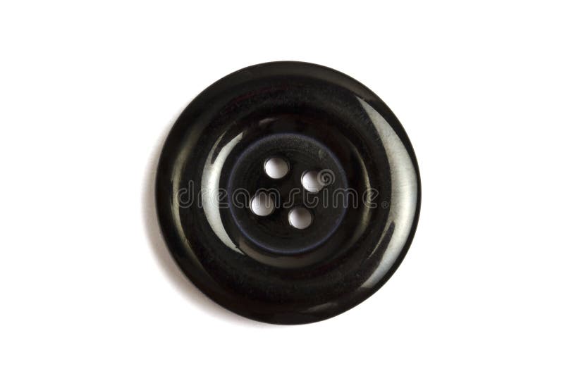 Black clothing button isolated on white