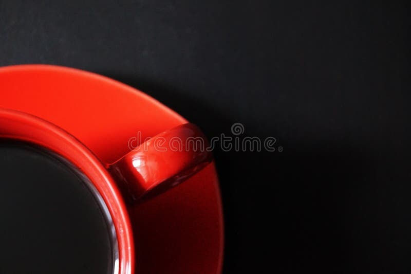 Black coffe in a red cup stock image Black coffe in a red cup stock image