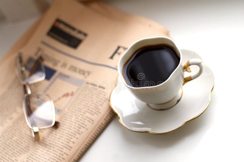 Black Coffee, Business Newspaper and Glasses royalty free stock photo