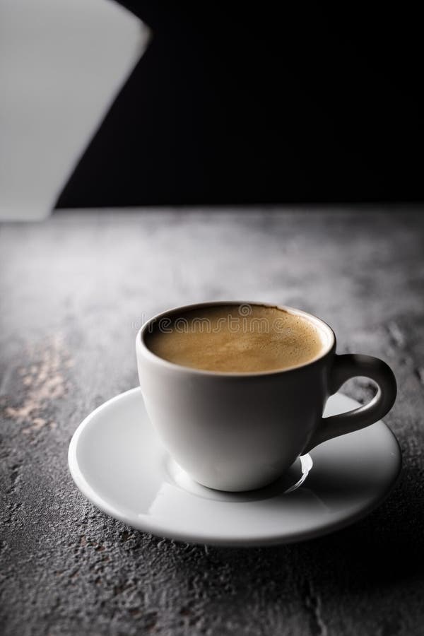 Black Coffee with Foam in a Cup, an Aromatic Hot Drink Stock Image