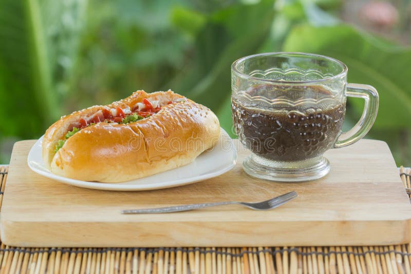 Black coffee and Hot Dog stock image. Image of fastfood 67647353