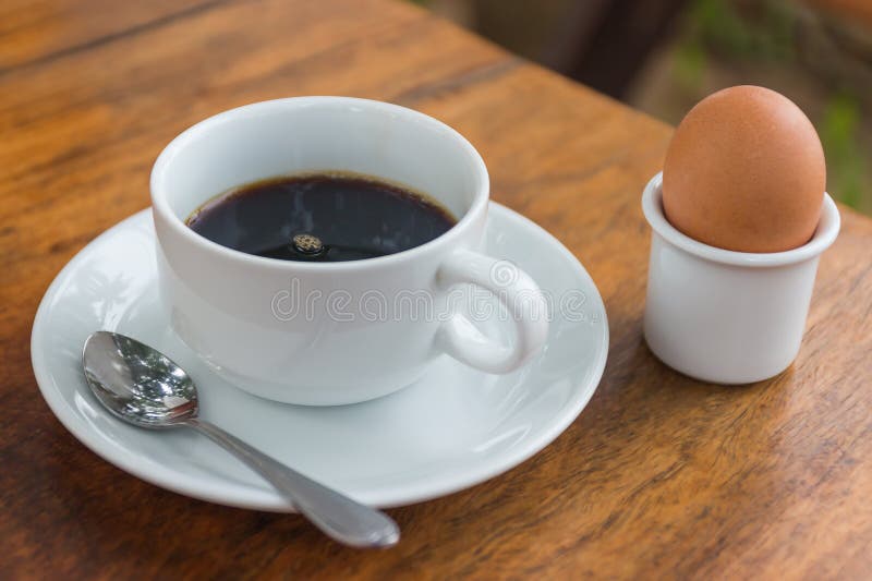 Black Coffee with Poached Egg Stock Photo Image of brown, food 53514148