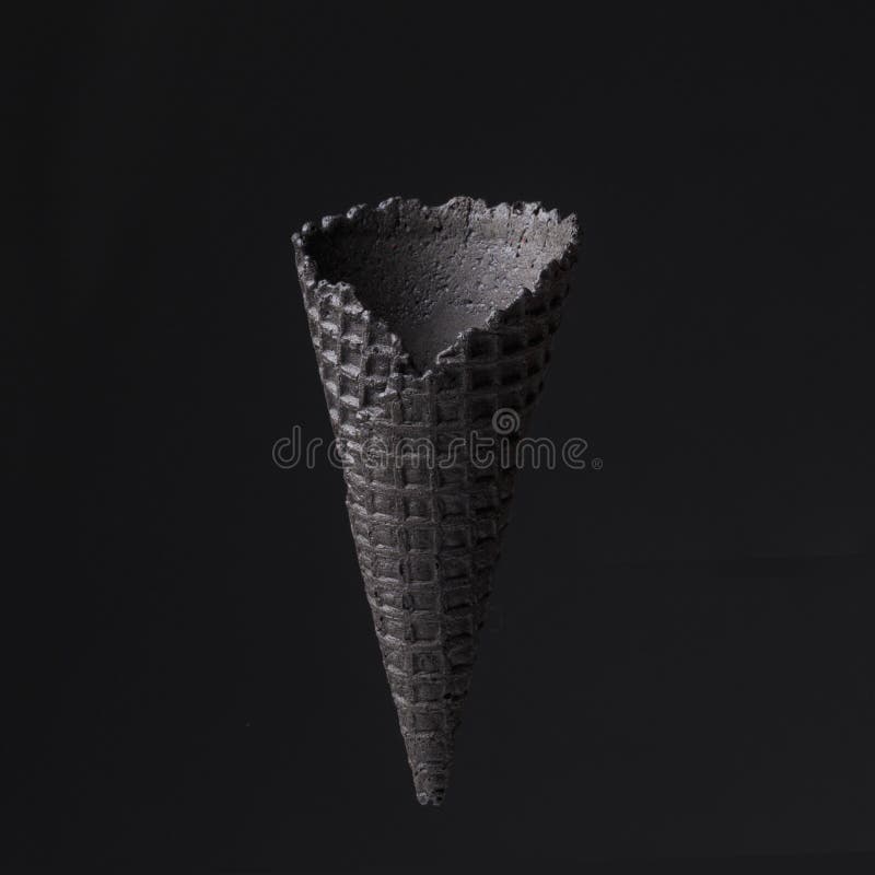 Black Cone for Ice Cream on Black Background. Creative, Minimalistic  Concept Stock Photo - Image of delicious, dessert: 143219588