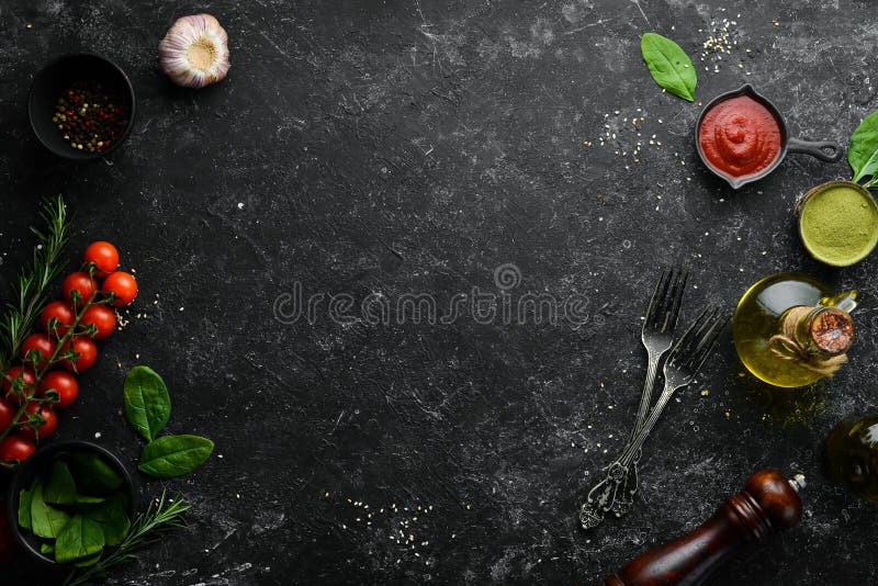 Black Cooking Background. Vegetables and Spices on the Table. Top View ...