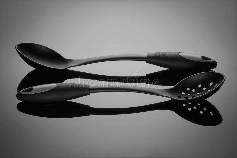 Black Cooking Spoons stock image. Image of textured, cook 48102129