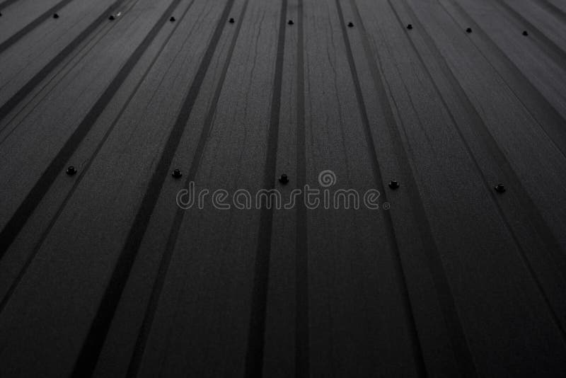 Black Corrugated Metal Sheet Texture Surface of the Wall. Galvanize