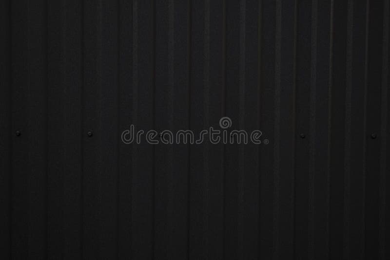 Black Corrugated Metal Sheet Texture Surface of the Wall. Galvanize