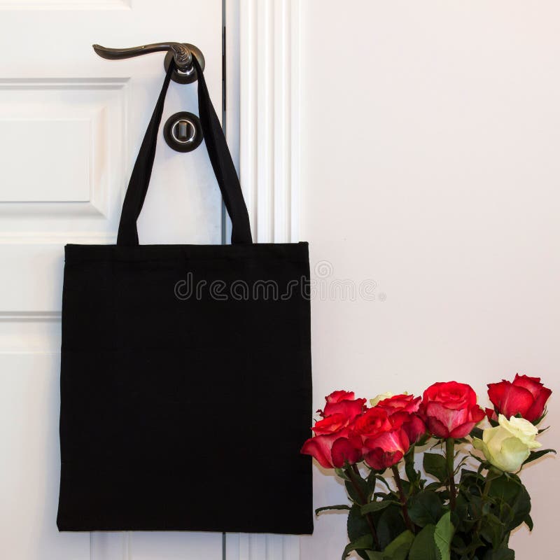 Black cotton eco tote bag, design mockup. Handmade shopping bags.