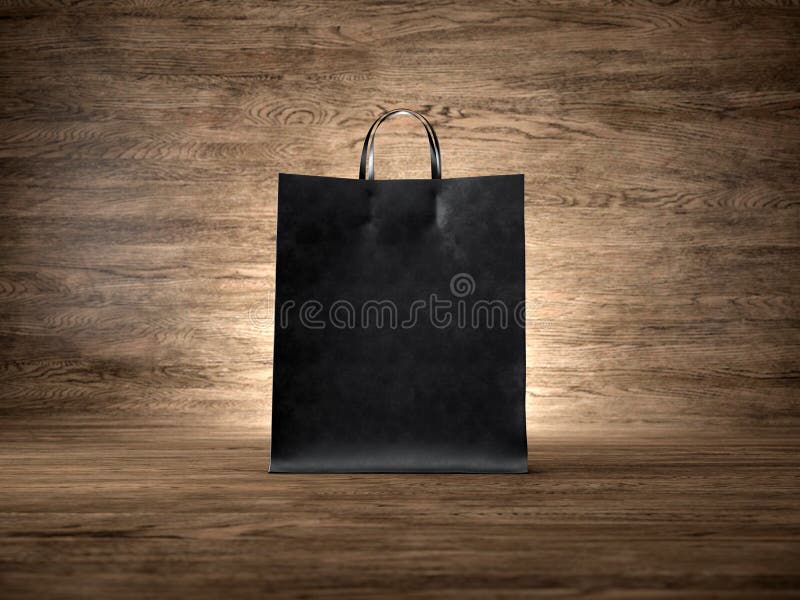 Black craft shopping bag, wood background. Focus royalty free stock images Black craft shopping bag, wood background. Focus royalty free stock images