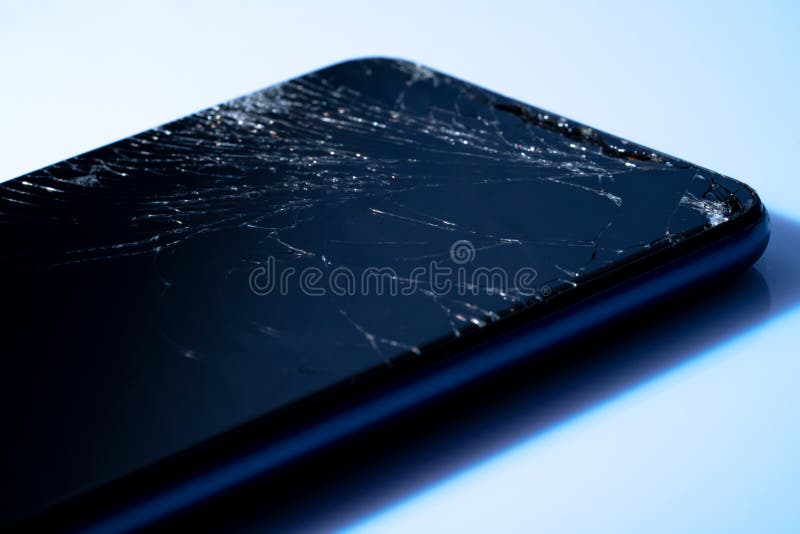 Black Crashed Smartphone with Broken Screen on White Background. Mobile