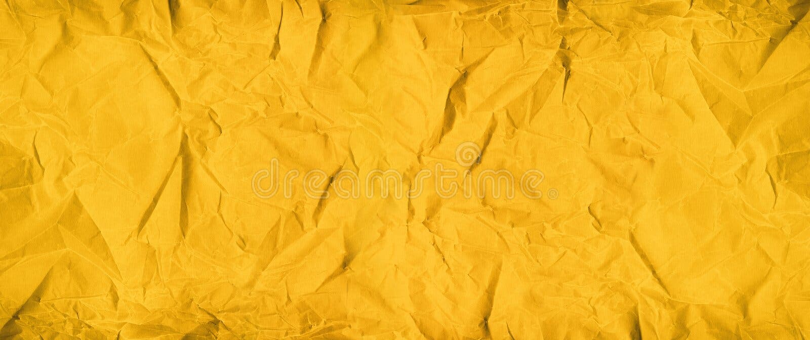 Yellow crumpled paper background texture hi-res stock photography