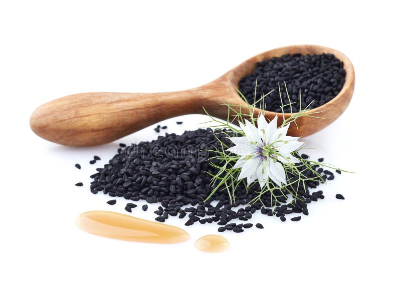 Black cumin oil with flower on white background