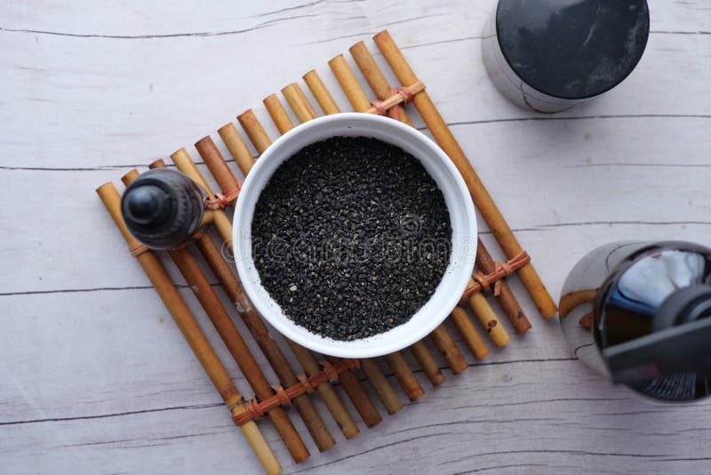 Black Cumin Seed and Oil on Table Top View Stock Image Image of