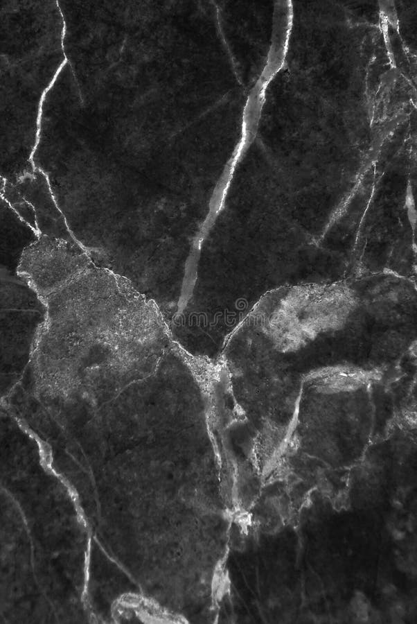 Black And Dark Marble Texture Shot Through With White Deep Veining