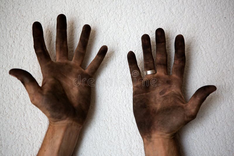 Black dirty man hands open palms on white