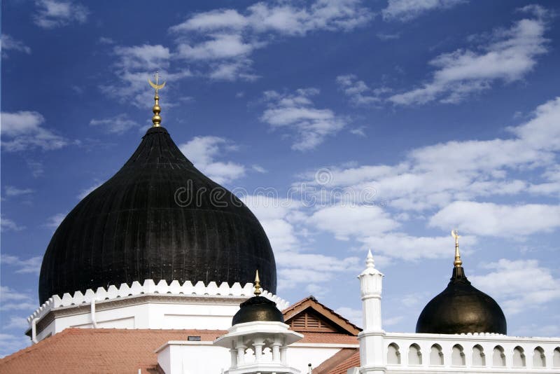 Black domes of a traditional mosque, malaysia