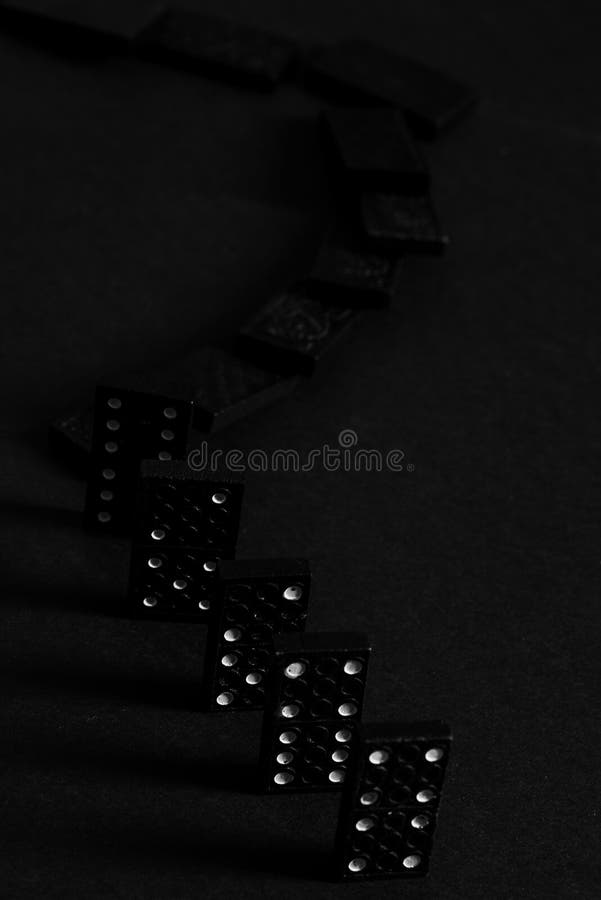 Black Dominoes game block on a colored background Stock Photo - Alamy
