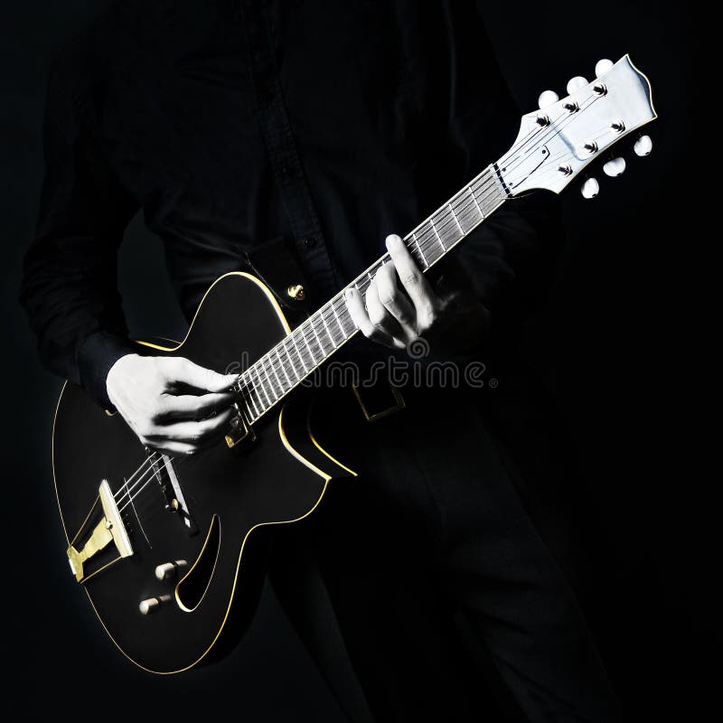 Black electric guitar royalty free stock photos