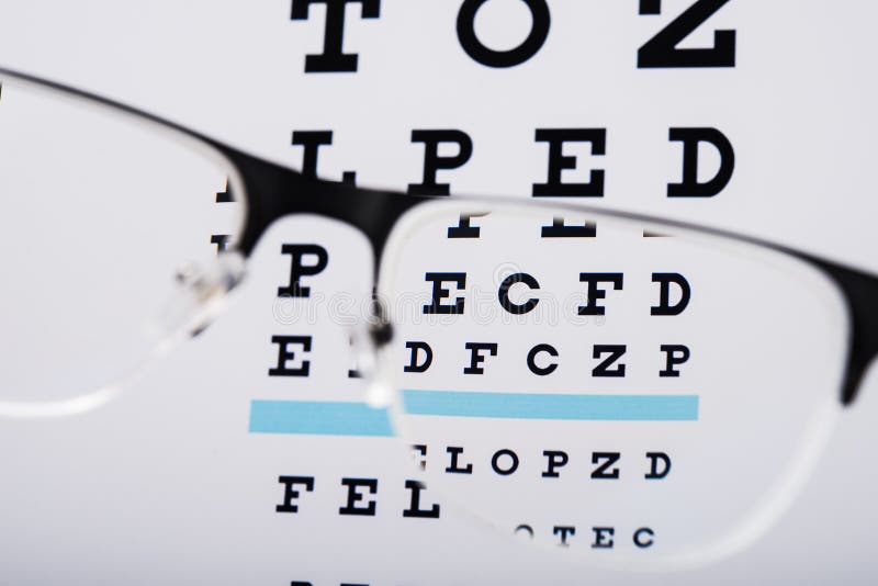 Black eye glasses and focus exam test. Spectacles, concept.