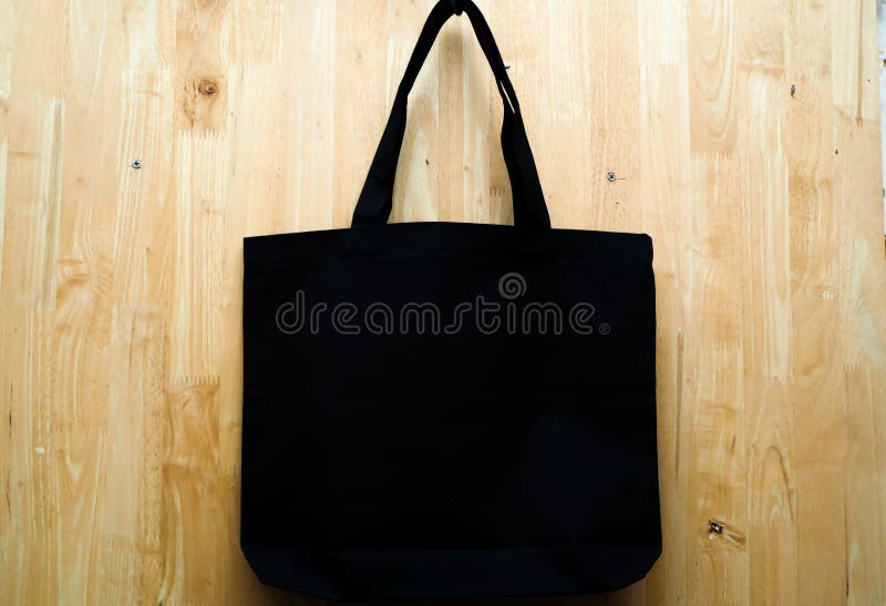 Black Fabric Bag On Wooden Background Stock Image Image of shopping