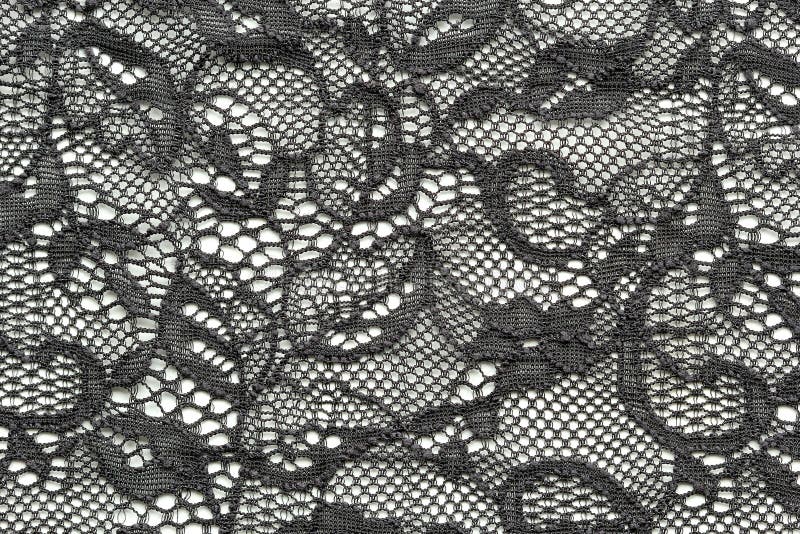 Black flower lace material texture macro shot royalty free stock photo Black flower lace material texture macro shot royalty free stock photo
