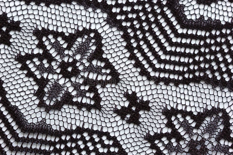 Black flowers lace material texture macro shot