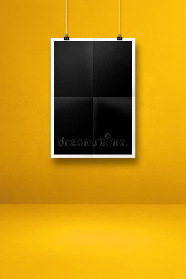 Black Folded Poster Hanging on a Green Wall with Clips Stock Photo