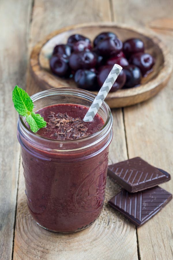 Black forest smoothie with cherry, almond milk and cacao, vertical stock photography Black forest smoothie with cherry, almond milk and cacao, vertical stock photography