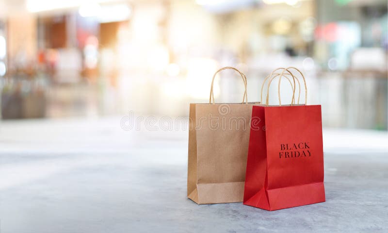 Black Friday shopping bags on floor outdoor