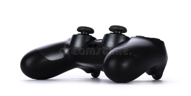 Black game console on white background stock photos