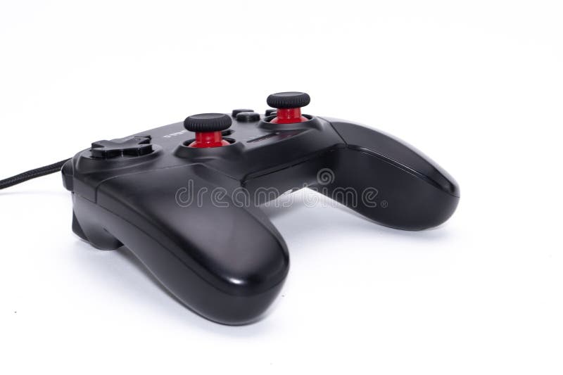 Black Game Controller with Red Buttons on White Background, Gaming Accessory stock image