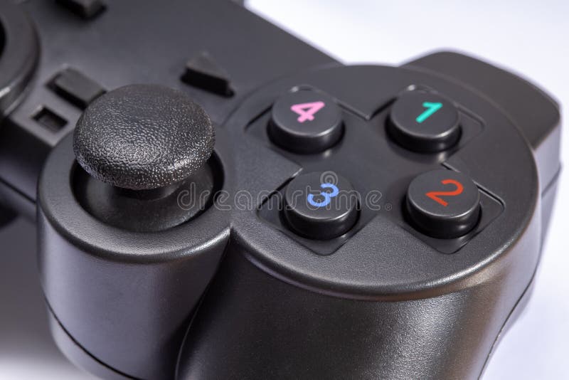 Black game joystick on white background close-up stock photography