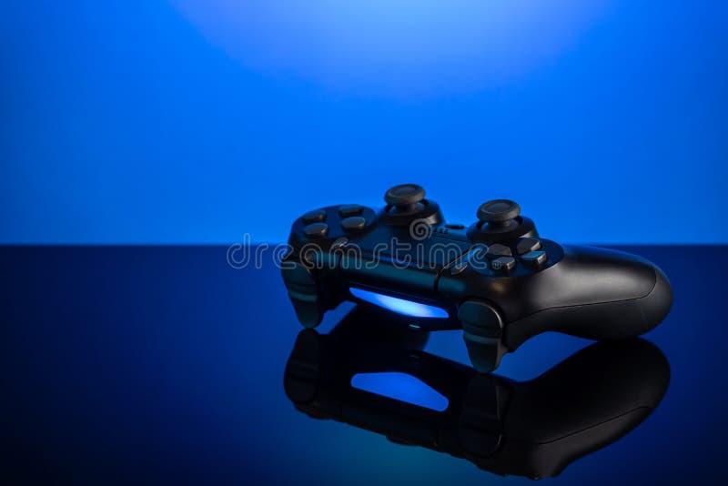 Black Gamepad with Backlight on Blue Back. Joystick on Glossy Surface Stock Photo - Image of isolated, equipment: 179664688 Black Gamepad with Backlight on Blue Back. Joystick on Glossy Surface Stock Photo - Image of isolated, equipment: 179664688