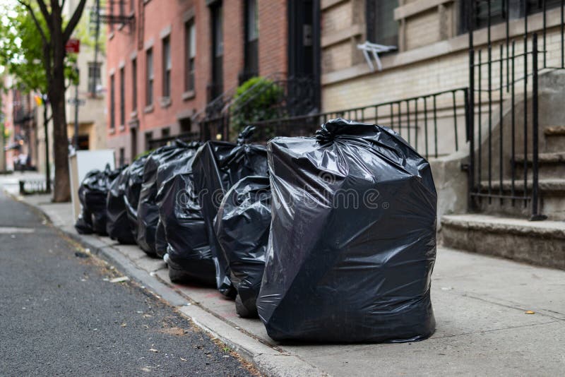 https://thumbs.dreamstime.com/b/black-garbage-bags-along-residential-street-greenwich-village-new-york-city-row-black-garbage-bags-along-254732220.jpg