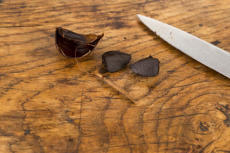 Clove of Black Garlic stock image. Image of asian, nutrition 106628579