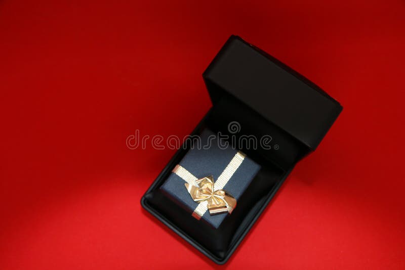 Black Gift Box for Jewelry on a Red Background Stock Image Image of