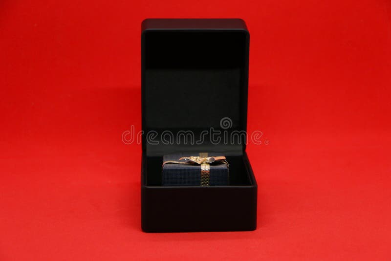 Black Gift Box for Jewelry on a Red Background Stock Photo Image of