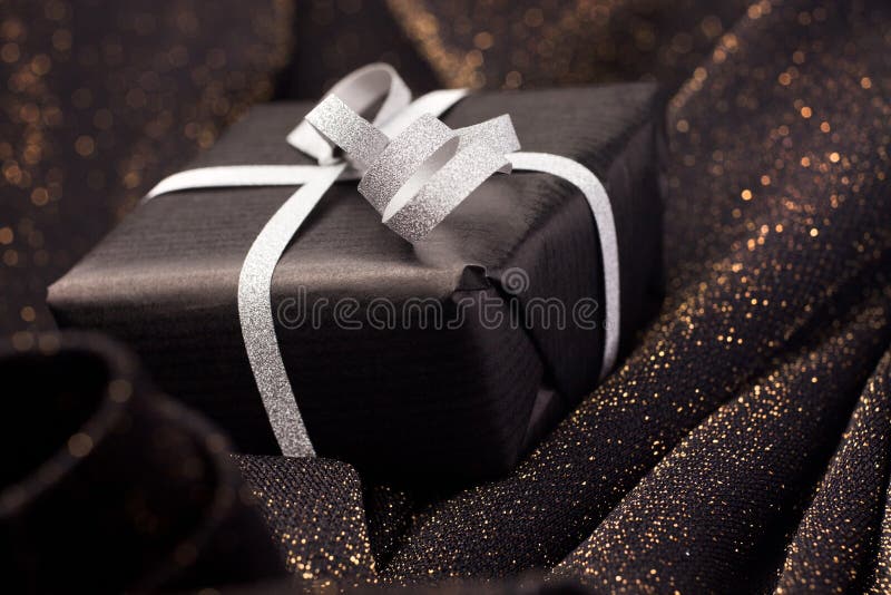 Black Gift Box on Shiny Background. Stock Photo Image of concept
