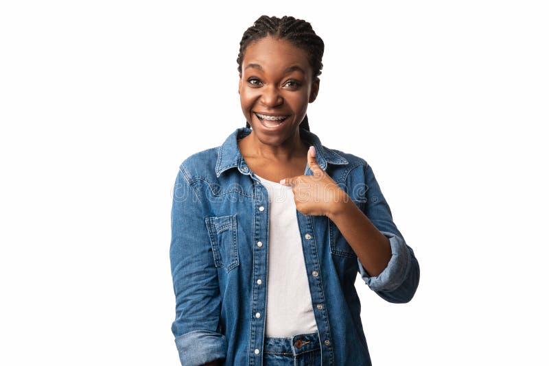 Black Girl In Braces Pointing Fingers At Herself, White Background