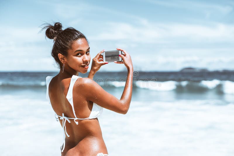 Wet Naked Beach Babes - Black Girl with Smartphone on the Beach Stock Photo - Image of hipster,  lifestyle: 110984942