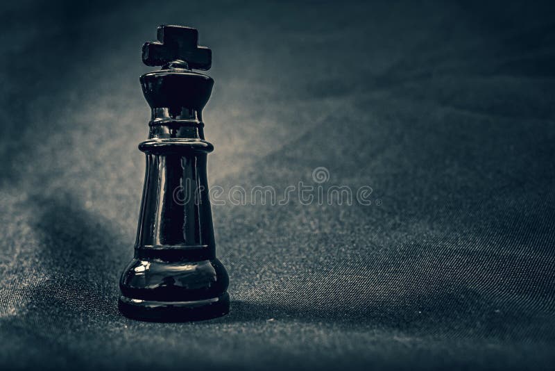 black glass queen chess piece on glass chess board Stock Photo - Alamy