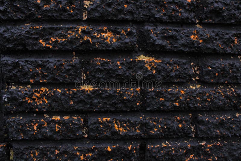 Black gold brick wall stock photo. Image of eating, golden 68921724